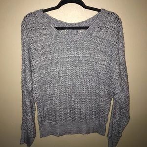 Grey sweater with button detailing on the back